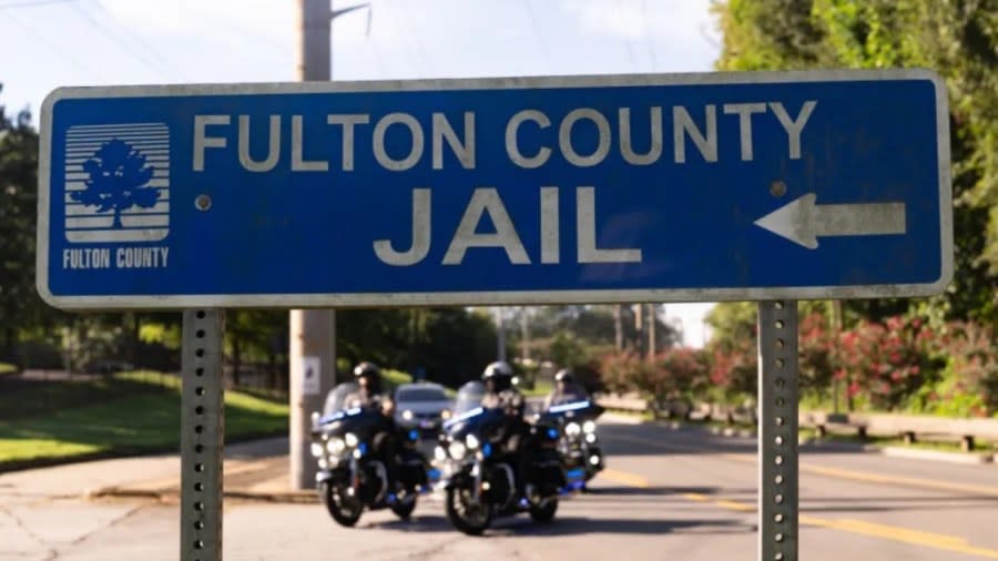 A sign points to the Fulton County Jail in Atlanta. The families of two Black men who died at the jail in August within days of each other plan to sue the county. (Photo: Megan Varner/Getty Images)