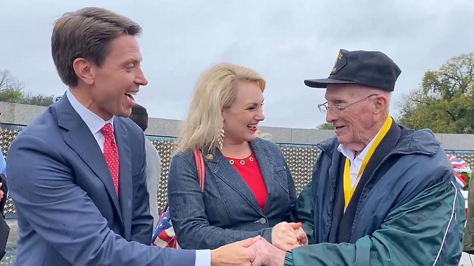 Matt and Melanie Miller greet a World War II veteran in Washington, D.C. The Millers helped dedicate the D-Day Prayer addition to the WWII Memorial on Veterans Day.
