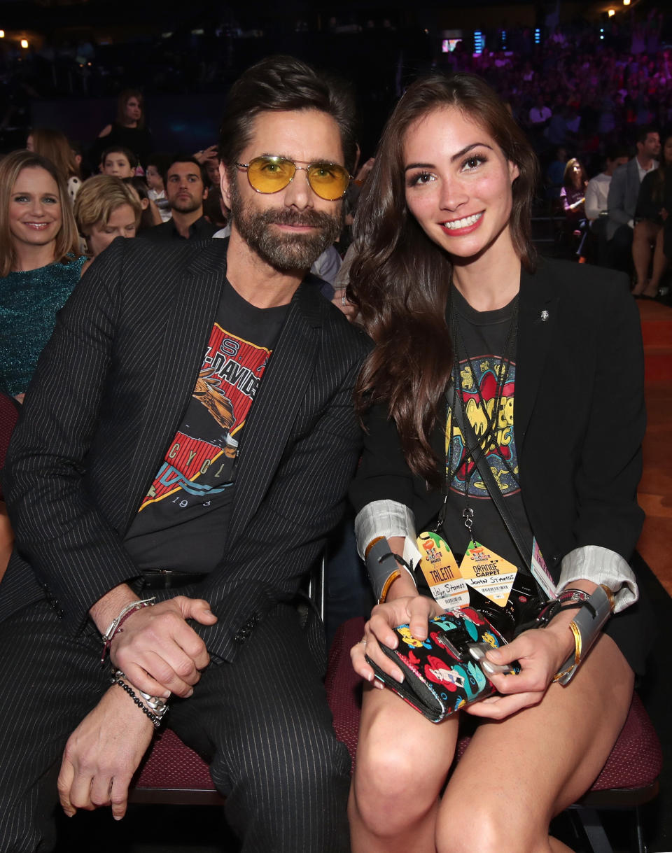 John Stamos and Caitlin McHugh at Nickelodeon’s 2017 Kids’ Choice Awards on March 11. (Photo: Getty Images)