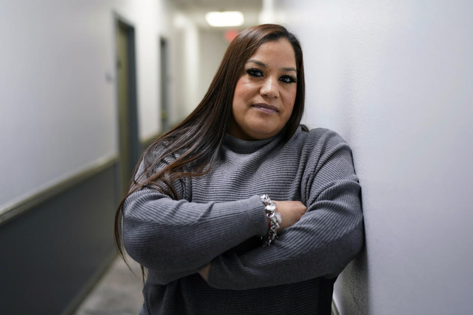 Sandra Torres, the mother of a girl who was one of 19 students and two teachers killed in the school shooting in Uvalde, Texas, poses for a photo at her attorney's office, Monday, Nov. 28, 2022, in San Antonio, where she filed a federal lawsuit against the school district, police, city and the maker of the gun used in the slaying. (AP Photo/Eric Gay)