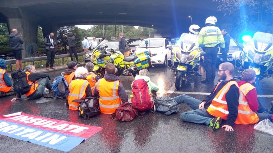 A demo on at Junction 3 of the M4 near Heathrow Airport (Insulate Britain/PA) (PA Media)