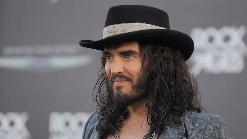 Russell Brand arrives at the "Rock of Ages" premiere at Grauman's Chinese Theatre on Friday June 8, 2012, in Los Angeles.