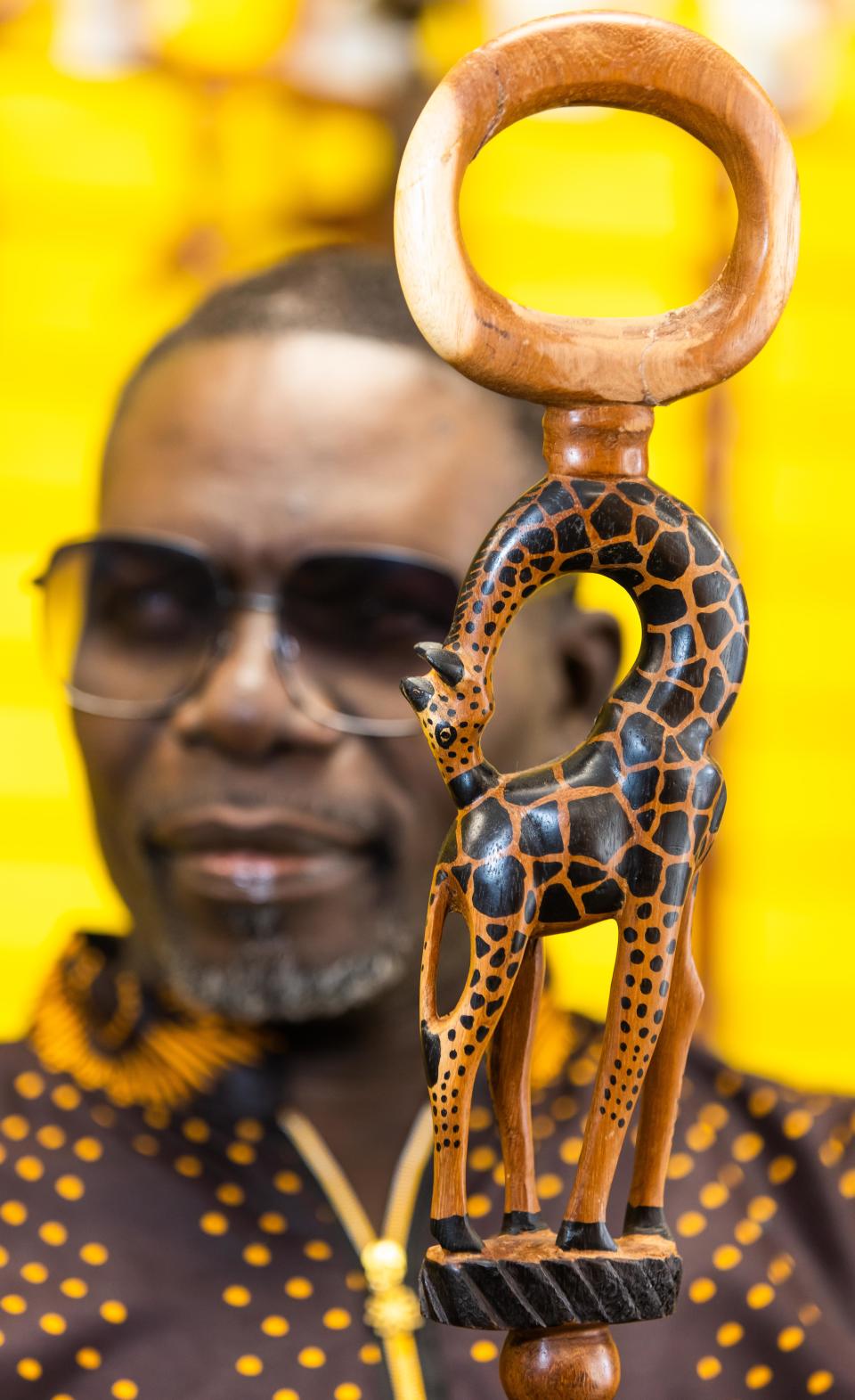 Dunstan Kalumba recently opened Abantu African Consignment Outlet, located at 3131 SW College Road, Suite 406, in Ocala. He shows off one of the canes that he sells in the store. They are made in Africa. The store is open Monday to Friday, 10 a.m. to 6 p.m., and Saturday 10 a.m. to 7 p.m. It also caters African-style food for events and festivals.