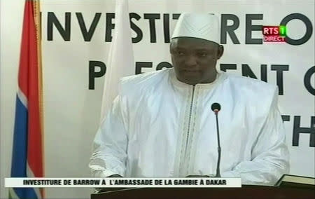 Gambia's new leader Adama Barrow speaks after swearing in as President at the Gambian embassy in Dakar, Senegal, in this still image taken from video, January 19, 2017. RTS via Reuters TV.