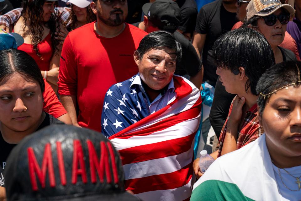Demonstrators gather to protest the new controversial immigration law, SB 1718, that was signed into law by Florida Governor Ron DeSantis. Hundreds gathered and marched in downtown West Palm Beach, Florida on June 1, 2023.