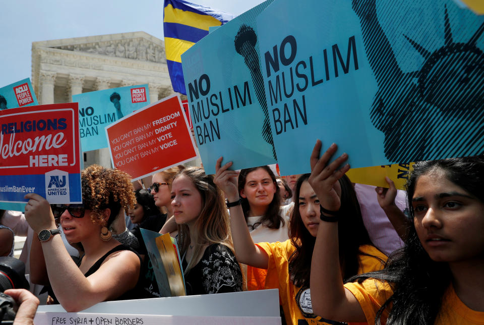 <p>People protest outside of the U.S. Supreme Court after the President Trump’s travel ban was upheld by the U.S. Supreme Court in Washington, June 26, 2018. (Photo: Leah Millis/Reuters) </p>