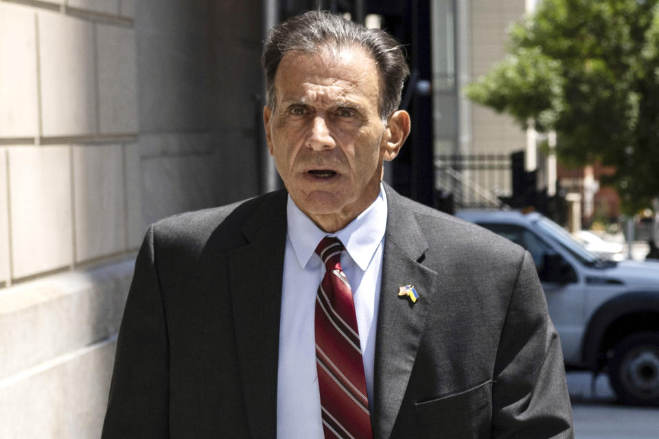 FILE — Retired NYPD detective Louis Scarcella, leaves Kings County Supreme Court, in the Brooklyn borough of New York, July. 27, 2022. Eliseo DeLeon was convicted again, Wednesday, Aug. 31, 2022, in the first retrial stemming from scrutiny of Scarcella, the once-lauded New York City homicide detective, who was later accused of framing suspects.(AP Photo/Yuki Iwamura, File)