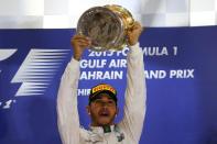 <b>1. Lewis Hamilton (motor racing) £88m (£68m in 2014)</b><br>British driver Lewis Hamilton celebrates with his trophy on the podium after winning the Formula One Bahrain Grand Prix at the Sakhir circuit on April 19, 2015