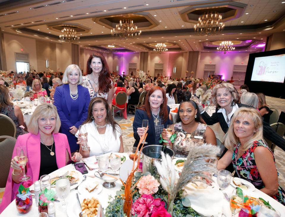 Some of the attendees at the Women United Volusia's 19th annual Power of the Purse charity fundraiser luncheon at the Hilton Daytona Beach Oceanfront Resort on Friday. Pictured, left to right: Nancy Lohman, Susan Persis, Jill Stephens, Bridget Bergens, Kathy Crotty, Daisy White, Rose Ann Tornatore and Mary McAree.