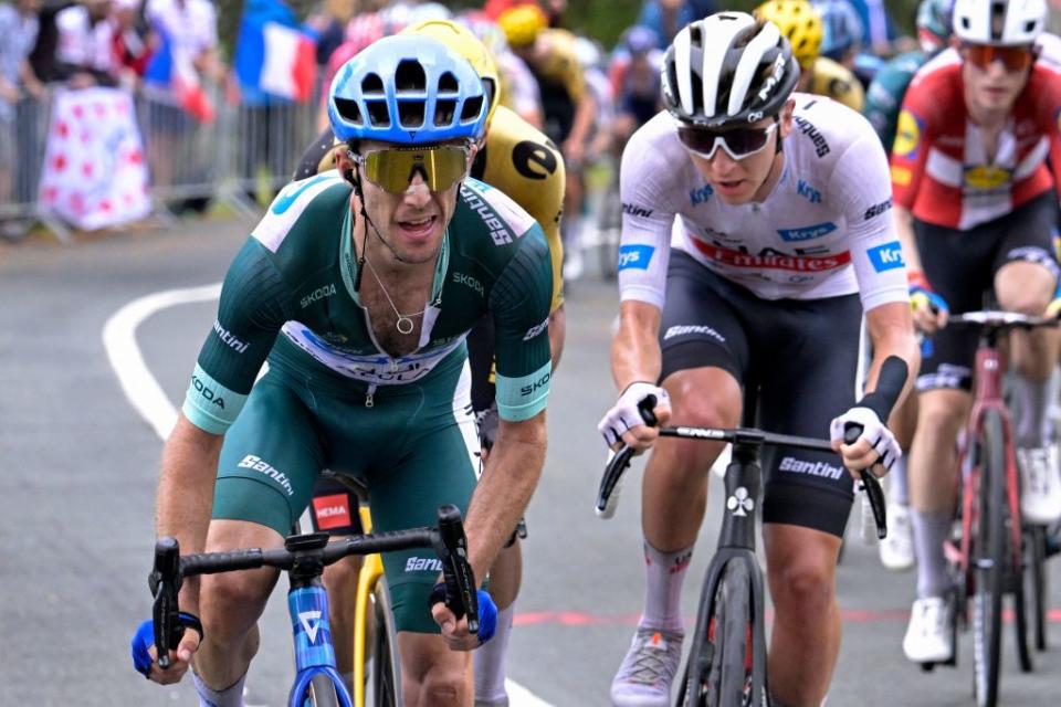 simon Team Jayco Alulas British rider Simon Yates wearing the best sprinters green jersey L cycles ahead of UAE Team Emirates Slovenian rider Tadej Pogacar wearing the best young riders white jersey R on Col Jaizkibel during the 2nd stage of the 110th edition of the Tour de France cycling race 2089 km between VitoriaGasteiz and San Sebastian in northern Spain on July 2 2023 Photo by Bernard PAPON  POOL  AFP Photo by BERNARD PAPONPOOLAFP via Getty Images