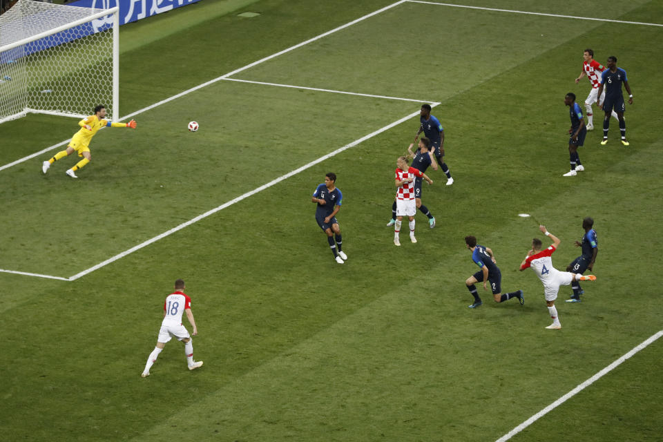 Croatia’s Ivan Perisic, 4, scores his side’s opening goal during the final match between France and Croatia at the 2018 soccer World Cup in the Luzhniki Stadium in Moscow, Russia, Sunday, July 15, 2018. (AP Photo/Rebecca Blackwell)