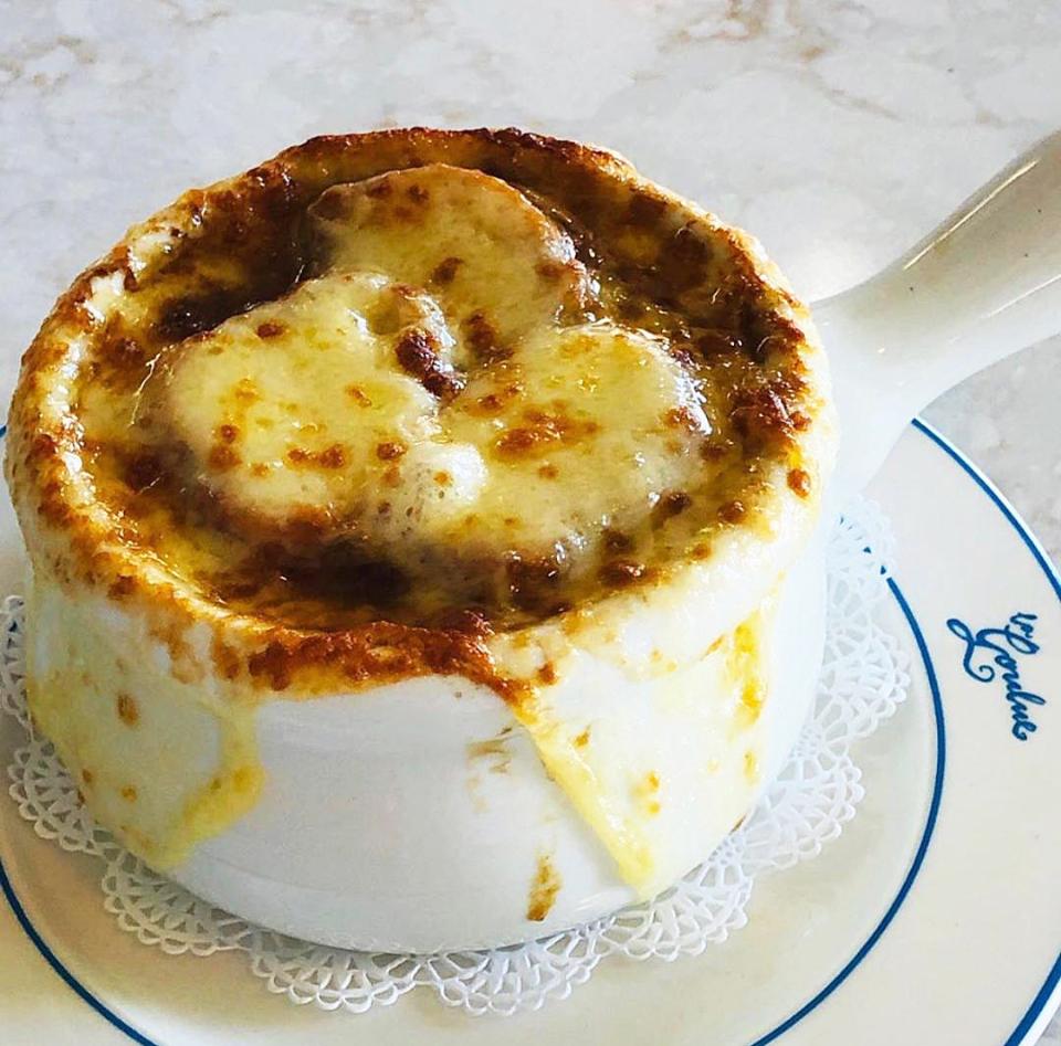 La Goulue features onion soup gratinée during its Saturday brunch.