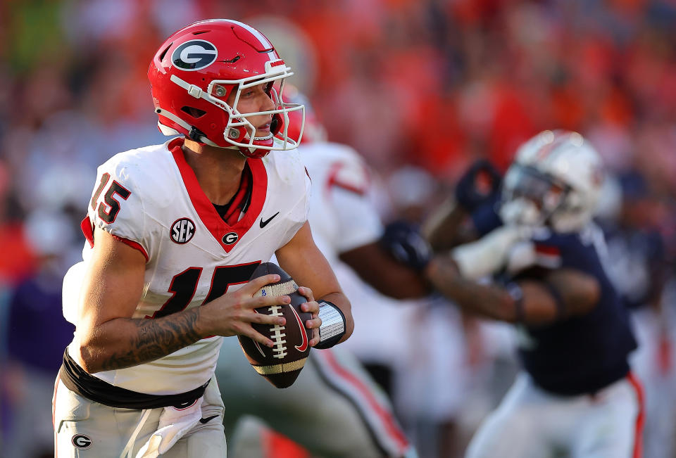 AUBURN, ALABAMA - SEPTEMBER 30:  Carson Beck #15 of the Georgia Bulldogs looks to pass against the Auburn Tigers during the fourth quarter at Jordan-Hare Stadium on September 30, 2023 in Auburn, Alabama. (Photo by Kevin C. Cox/Getty Images)