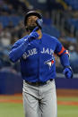 Toronto Blue Jays' Teoscar Hernandez reacts after his solo home run off Tampa Bay Rays pitcher Shane Baz during the second inning of a baseball game Monday, Sept. 20, 2021, in St. Petersburg, Fla. (AP Photo/Chris O'Meara)