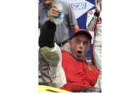 FILE - Driver Mike Stefanik cheers after winning the NASCAR Whelen Modified Tour auto race, Saturday July 14, 2012, at New Hampshire Motor Speedway in Loudon, N.H. Stefanik will be posthumously inducted into the NASCAR Hall of Fame during ceremonies in Charlotte, N.C., Friday, Jan. 21, 2022. (AP Photo/Jim Cole, File)