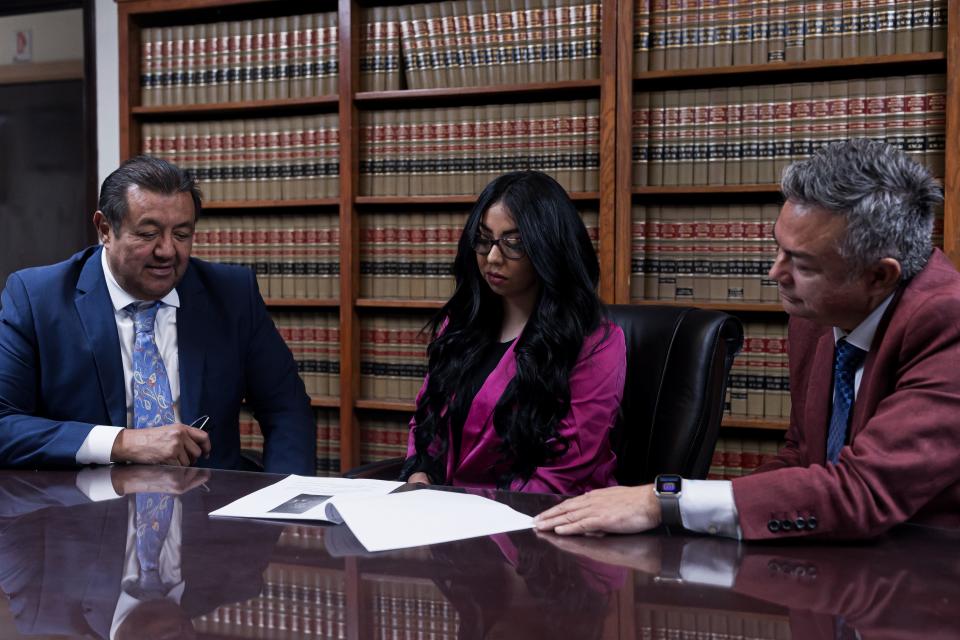 Samantha Magallanes speaks with her attorneys, Sergio Saldivar and Gabriel S. Perez, on Tuesday, Dec. 5, 2023, at the Law Offices of Sergio Saldivar in El Paso, Texas, about a lawsuit they have with the SISD Police Department about an excessive force incident that happened on June 23, 2023.