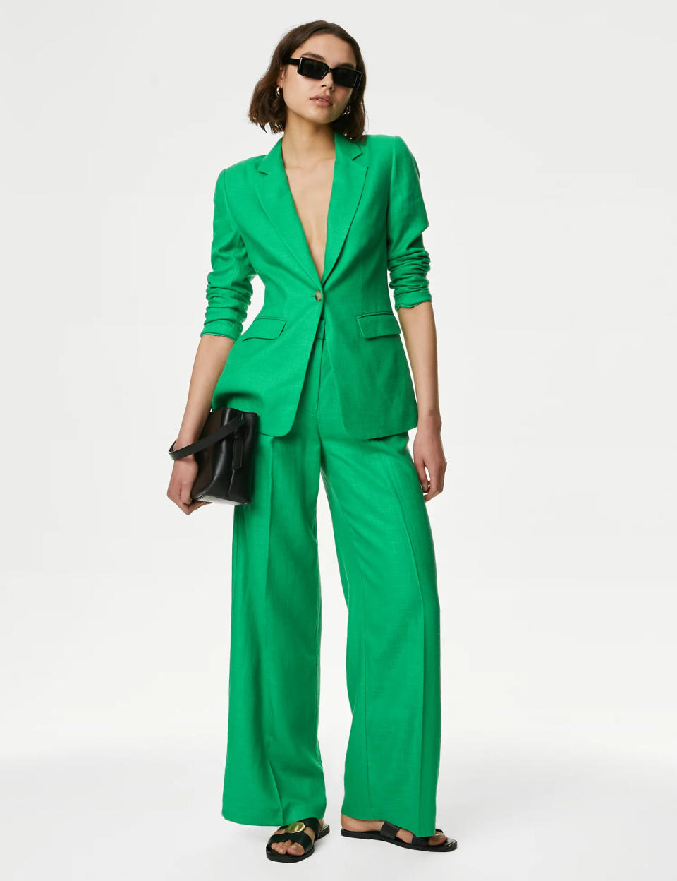 M&S recently bought out the popular trousers in a statement green hue. (Marks & Spencer)