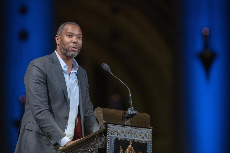 Author Ta-Nehisi Coates speaks during the Celebration of the Life of Toni Morrison, Thursday, Nov. 21, 2019, at the Cathedral of St. John the Divine in New York. Morrison, a Nobel laureate, died in August at 88. (AP Photo/Mary Altaffer)