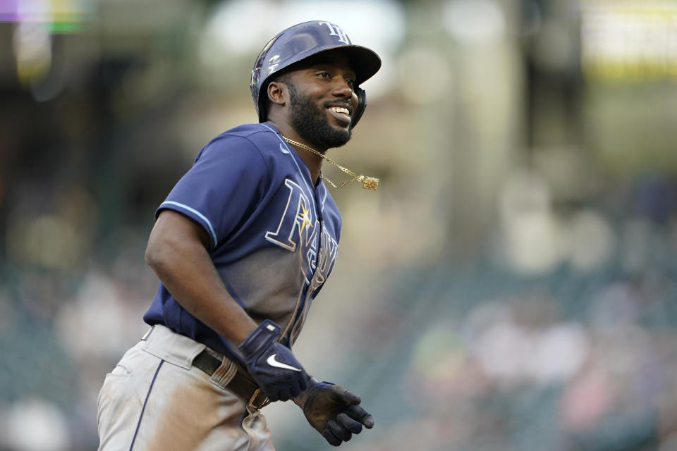 Tampa Bay Rays' Randy Arozarena smiles as he runs the bases after hitting a two-run home run during the fourth inning of the team's baseball game against the Seattle Mariners on Thursday, June 17, 2021, in Seattle. (AP Photo/Ted S. Warren)
