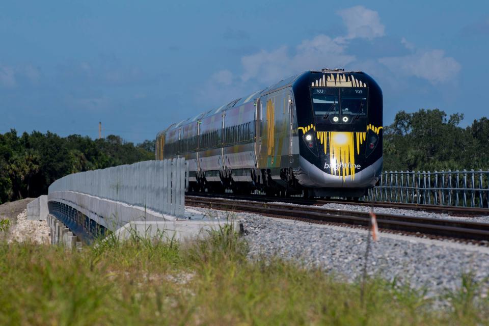 A Brightline train crosses over the Saint Sebastian River bridge in Roseland on Friday, Sept. 22, 2023.