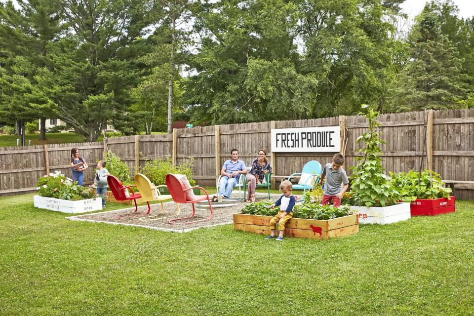 <p>After renovating their farmhouse, a Wisconsin family set their sights on their backyard, adding wooden garden beds (designed to look like old fruit boxes!) around a dug-out fire pit and seating area.</p><p><strong><a href="https://www.countryliving.com/home-design/house-tours/g20902439/colorful-wisconsin-farmhouse-house-tour/" rel="nofollow noopener" target="_blank" data-ylk="slk:Read more about this renovated farmhouse;elm:context_link;itc:0;sec:content-canvas" class="link ">Read more about this renovated farmhouse</a>.</strong></p><p><a class="link " href="https://go.redirectingat.com?id=74968X1596630&url=https%3A%2F%2Fwww.wayfair.com%2Foutdoor%2Fpdp%2Farlmont-co-danny-cedar-raised-garden-w002045641.html&sref=https%3A%2F%2Fwww.countryliving.com%2Fgardening%2Fgarden-tours%2Fg1432%2Flandscaping-ideas%2F" rel="nofollow noopener" target="_blank" data-ylk="slk:SHOP RAISED BEDS;elm:context_link;itc:0;sec:content-canvas">SHOP RAISED BEDS</a></p>