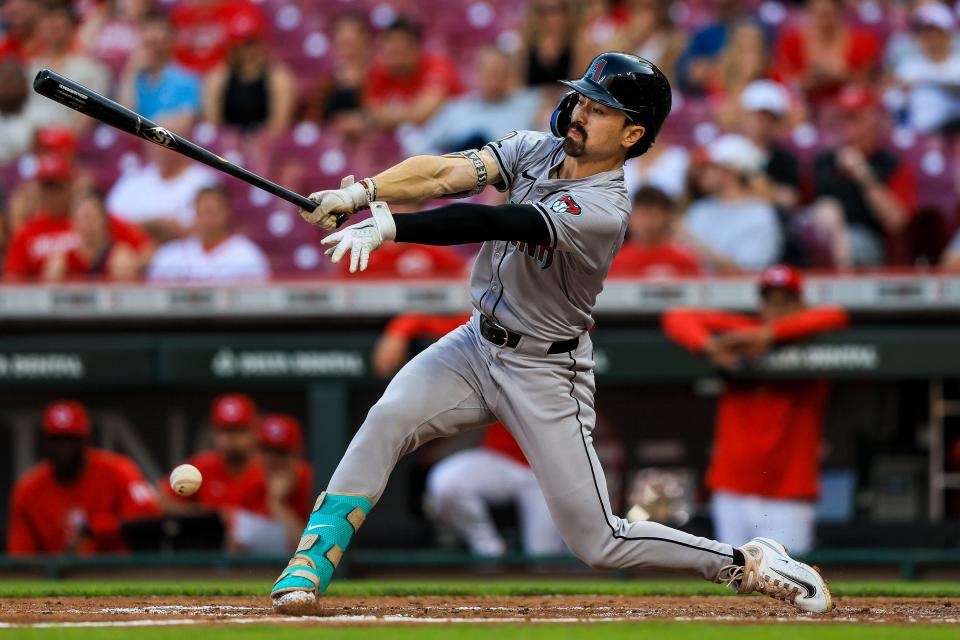 Arizona Diamondbacks outfielder Corbin Carroll (7) hits an RBI single in the third inning against the Cincinnati Reds at Great American Ball Park in Cincinnati on May 7, 2024.