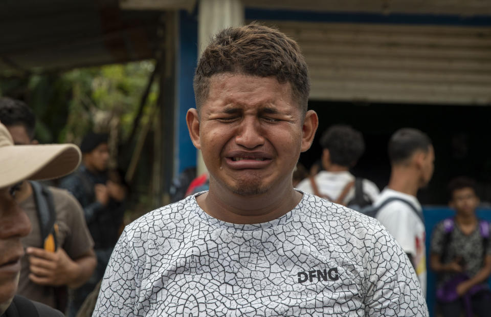 A teenage Honduran migrant traveling in a group of migrants cries as is he deported by Guatemalan police in Morales, Guatemala, Thursday, Jan. 16, 2020. Less-organized migrants, tighter immigration control by Guatemalan authorities and the presence of U.S. advisers have reduced the likelihood that the hundreds of migrants who departed Honduras will form anything like the cohesive procession the term “caravan” now conjures. (AP Photo/Moises Castillo)