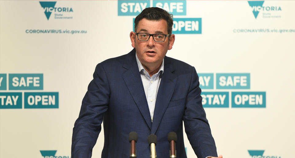 Daniel Andrews at a media conference discussing returned travellers who skipped quarantine 