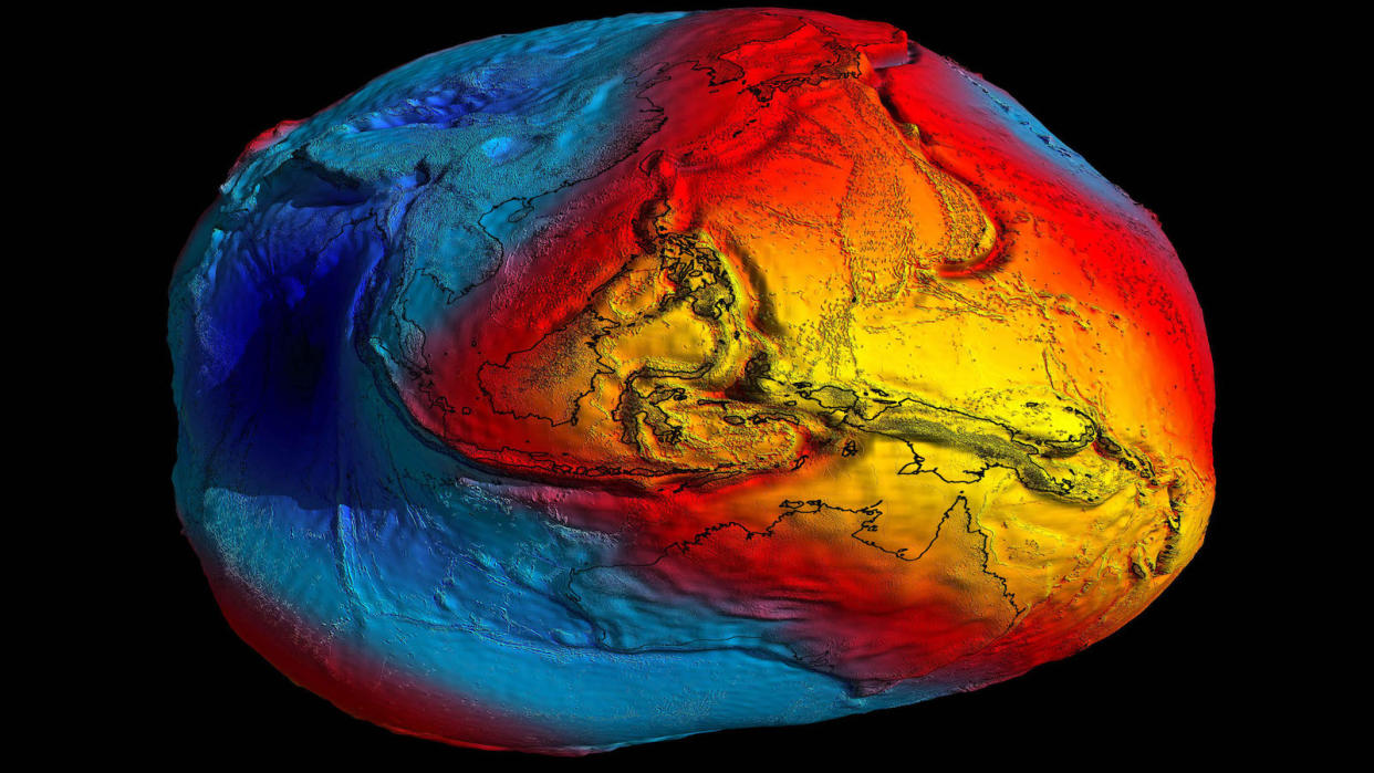  A rendering of the Earth's gravity as seen by the European Space Agency' Goce satellite. Yellow and orange regions are those with more gravity and the blue, marked over the Indian Ocean, shows where gravity is less pronounced.  