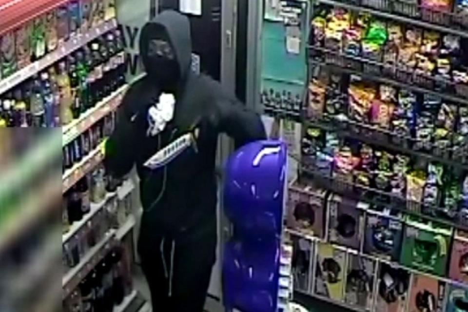 The man threatened a shopkeeper with a large hunting knife (Met Police)