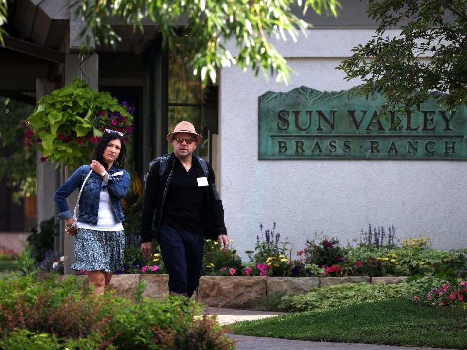 Jeff Lawson and Erica Lawson walk outside at Sun Valley