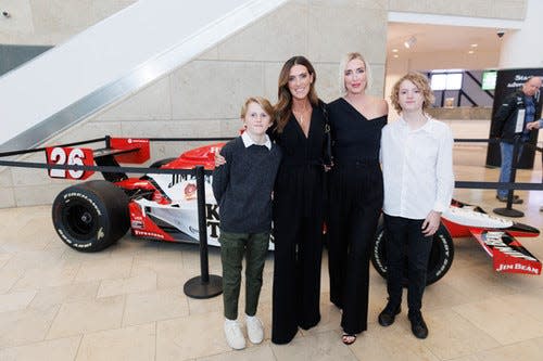 Director Laura Brownson (second from left) and the Wheldons (Oliver, Susie and Sebastian) pose together ahead of the airing of the film 'The Lionheart', which captures the essence of the late-Dan Wheldon and his family, to open the first night of the Heartland International Film Festival.