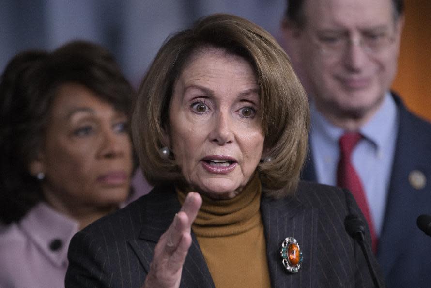 FILE - In this Feb. 6, 2017 file photo, House Minority Leader Nancy Pelosi of Calif., center, joined by Rep. Maxine Waters, D-Calif., left, and Rep. Brad Sherman, D-Calif. speaks during a news conference on Capitol Hill in Washington. House Democrats are united against President Donald Trump, but as they wrap up a somewhat painful, inward-looking retreat, they are still trying to figure out how to turn that opposition into a winning strategy. (AP Photo/J. Scott Applewhite, File)