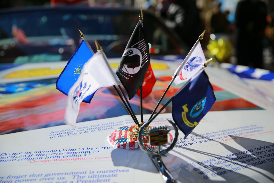 <p>Flags adorn an old Cadillac Eldorado convertible before the Veterans Day parade on Fifth Avenue in New York on Nov. 11, 2017. (Photo: Gordon Donovan/Yahoo News) </p>