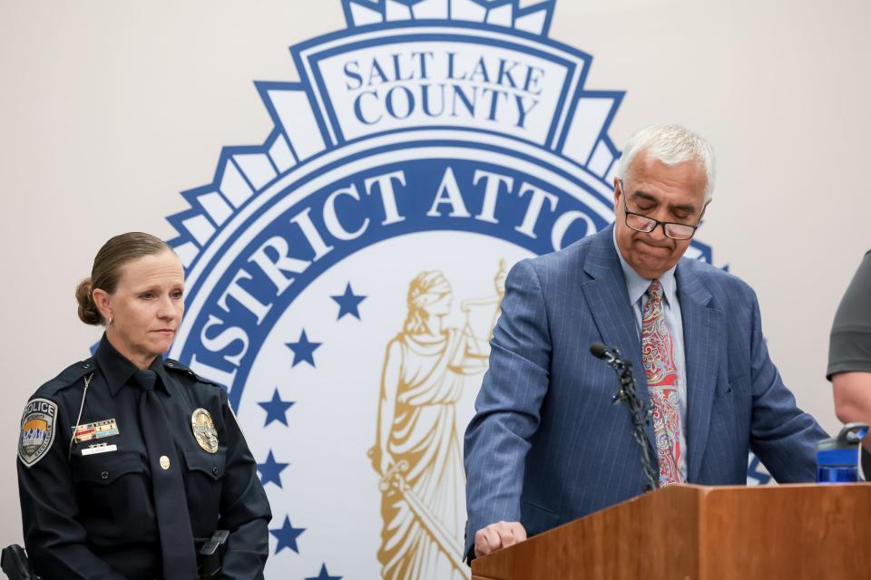 Sandy Police Detective Cori Biggs listens to Salt Lake County District Attorney Sim Gill before he presented her with the Community Justice Award at the District Attorney’s Office in Salt Lake City on Thursday, June 22, 2023. Biggs was honored for her work in investigating the child abuse homicide case resulting from 6-year-old Norlin Cruz’s death. | Spenser Heaps, Deseret News