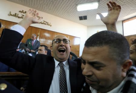 FILE PHOTO: Egyptian lawyer and ex-Presidential candidate Khaled Ali shouts slogans inside the State Council courthouse after a ruling against the Egypt-Saudi border demarcation agreement, in Cairo, Egypt January 16, 2017. REUTERS/Mohamed Abd El Ghany