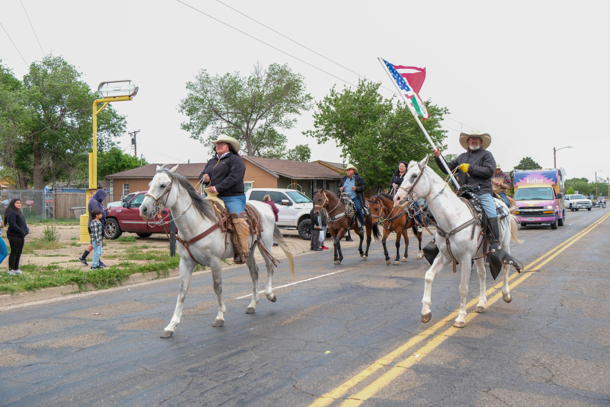 Riders wave to the crowd Saturday at the annual Cinco de Mayo Parade in Amarillo.