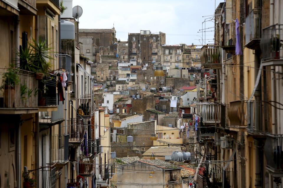 A view of Caltagirone in Sicily March 18, 2015. The number of migrants reaching Italy by sea this year is set to top last year's record of 170,000, the International Organization for Migration (IOM) said. In the past week alone 10,000 have arrived. Another 400 people drowned before making it to Italy's shores, survivors said. The number of minors traveling alone in this mass migration has soared -- underage arrivals to Italy tripled in 2014 from the previous year. Picture taken March 18, 2015. To match Insight ITALY-MIGRANTS/BOYS REUTERS/Alessandro Bianchi