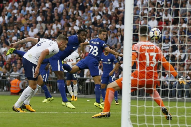 Chelsea's striker Michy Batshuayi (2ndL) scores an own goal during an English Premier League football match against Tottenham Hotspur on August 20, 2017