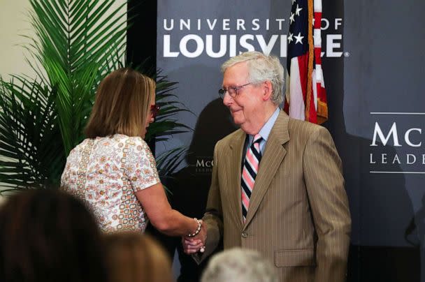 PHOTO: Sen. Mitch McConnell, right, greeted Arizona Sen. Kyrsten Sinema as she took the stage to make remarks about bipartisanship during an event at the McConnell Center on the campus of the University of Louisville in Louisville, Ky. on Sept. 26, 2022. (Sam Upshaw Jr./Courier Journal/USA Today)