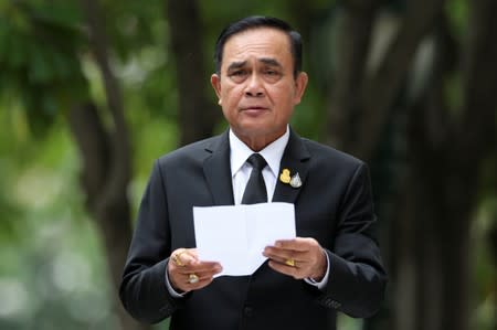 Thailand's Prime Minister Prayuth Chan-ocha speaks to media members at the Government House in Bangkok