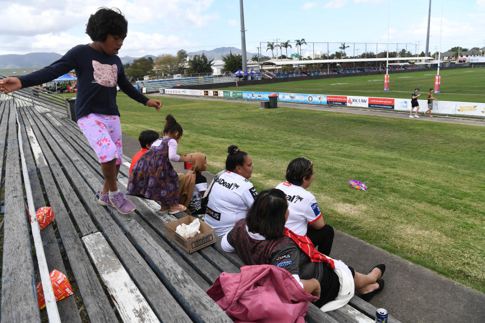 NRL Fans are seen at an empty Browne Park in Rockhampton after the cancellation of the NRL Round 20 match.