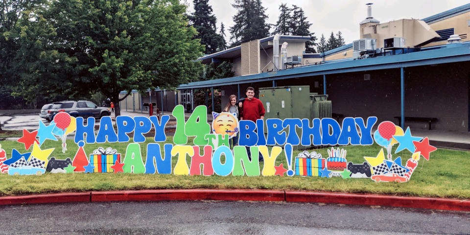 Anthony and a friend at his birthday car parade. (Courtesy Theresa Lawson)