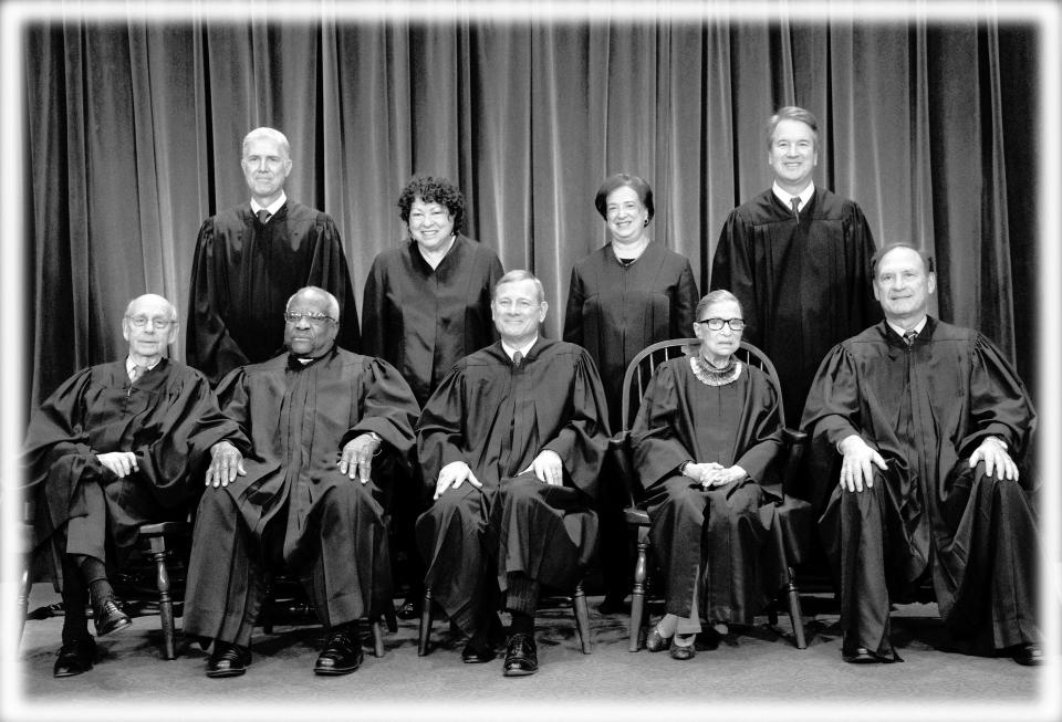The justices of the U.S. Supreme Court gather for a formal group portrait to include the new Associate Justice, top row, far right, at the Supreme Court Building in Washington, Friday, Nov. 30, 2018. Seated from left: Associate Justice Stephen Breyer, Associate Justice Clarence Thomas, Chief Justice of the United States John G. Roberts, Associate Justice Ruth Bader Ginsburg and Associate Justice Samuel Alito Jr. Standing behind from left: Associate Justice Neil Gorsuch, Associate Justice Sonia Sotomayor, Associate Justice Elena Kagan and Associate Justice Brett M. Kavanaugh. (Photo: J. Scott Applewhite/AP, digitally enhanced by Yahoo News)