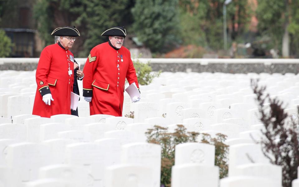  former servicemen at the Commonwealth War Graves CommisionsÂ’s Tyne Cot Cemetery - Credit: Chris Jackson/Getty