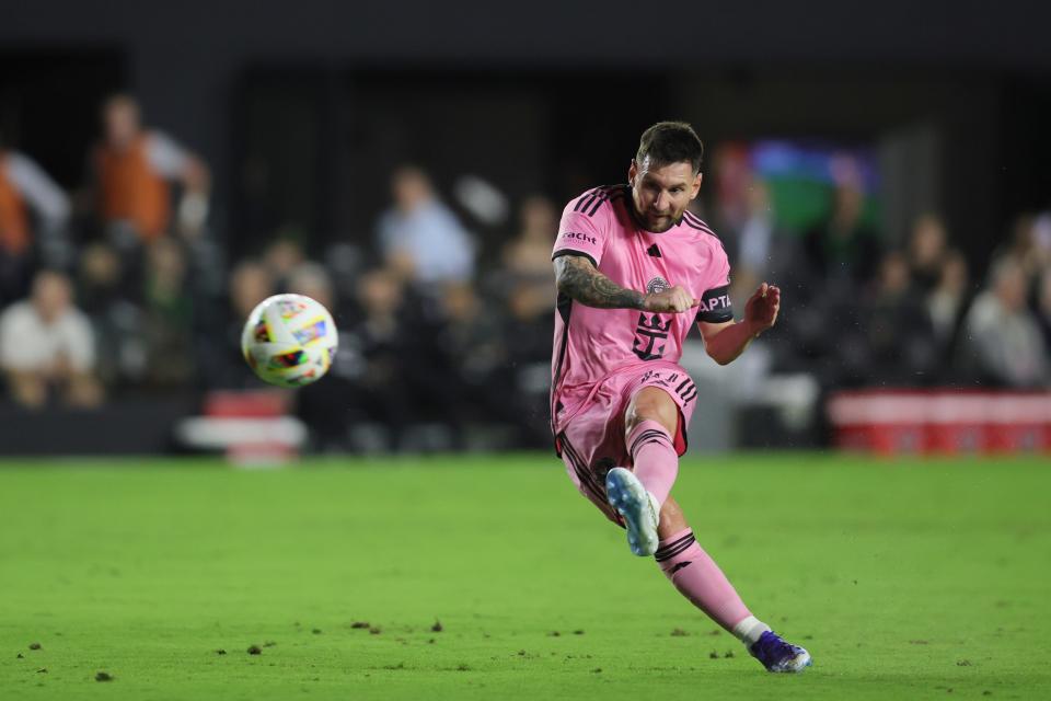 Inter Miami CF forward Lionel Messi (10) takes a free kick against the Newell's Old Boys during the first half at DRV PNK Stadium.