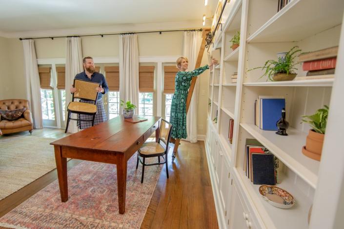 as seen on hgtv’s hometown, ben and erin napier enjoy some time alone putting final touches together in the primary bedroom of their newly renovated home in laurel, ms