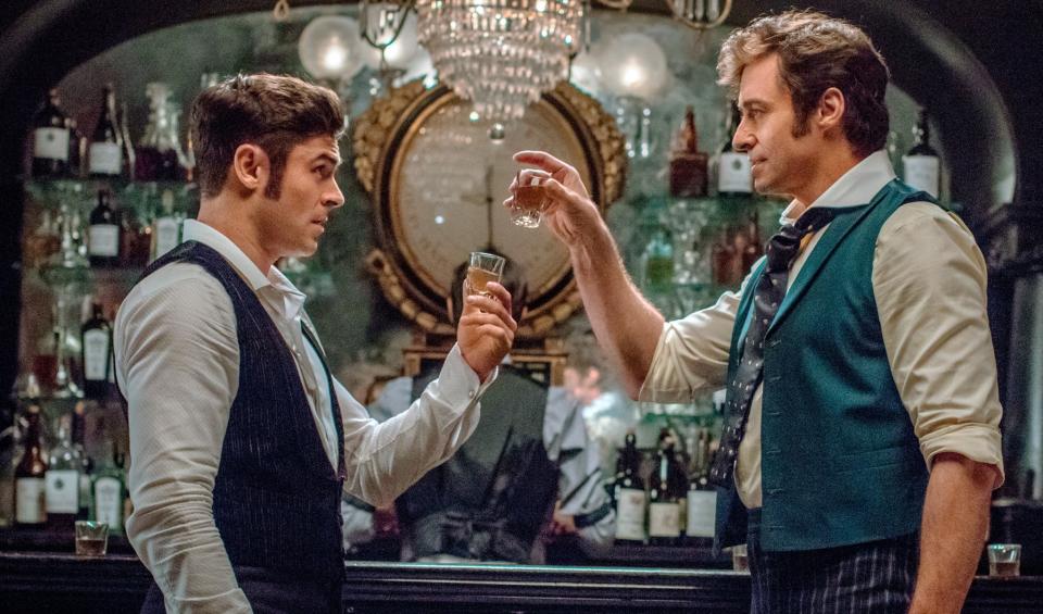 Zac Efron and Hugh Jackman in 'The Greatest Showman' (credit: 20th Century Fox)