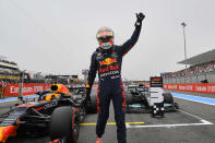 Red Bull driver Max Verstappen of the Netherlands waves to the crowd after he clocked the fastest time during the qualifying session ahead of the French Formula One Grand Prix at the Paul Ricard racetrack in Le Castellet, southern France, Saturday, June 19, 2021. The French Grand Prix will be held on Sunday. (Nicolas Tucat/Pool via AP)