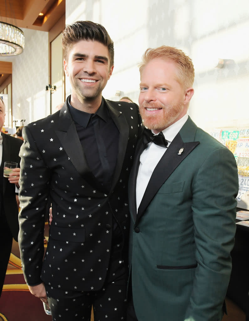 closeup of the two in suits for an event